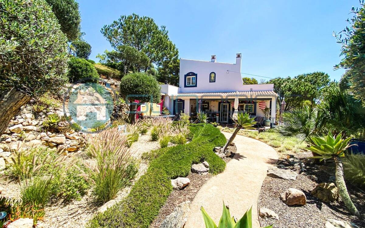 Unique Property Set On Hill With Beautiful Garden And Within Walking Distance To The Beach